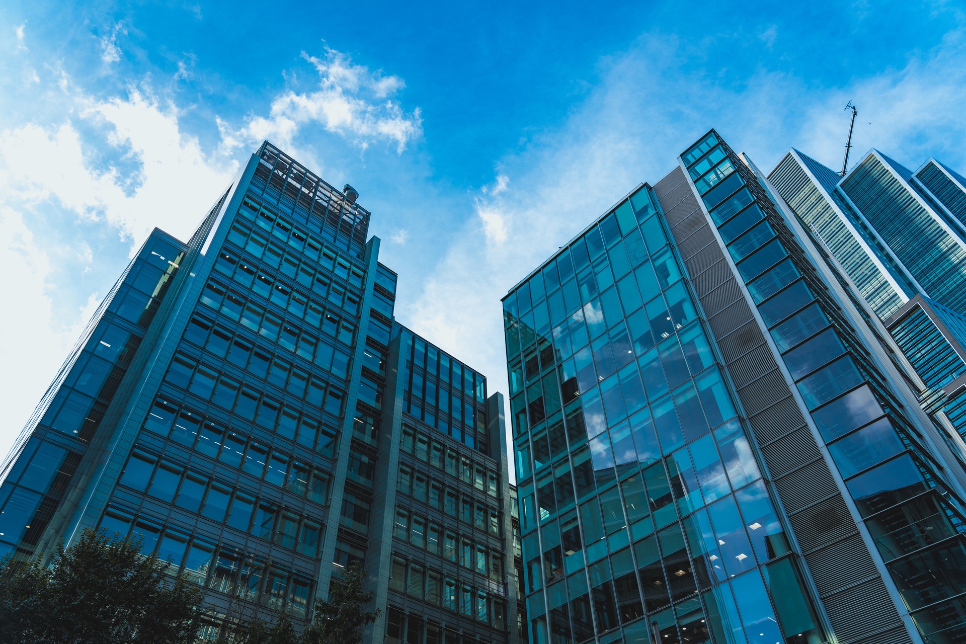 Looking directly up at the skyline of the financial district in central London